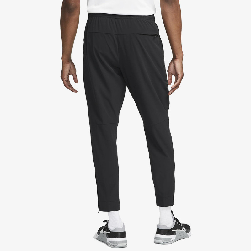 Nike Pjesa e poshtme e kostumit M NK DF UNLIMITED PANT TPR 
