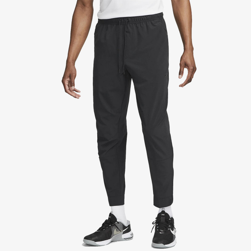 Nike Pjesa e poshtme e kostumit M NK DF UNLIMITED PANT TPR 