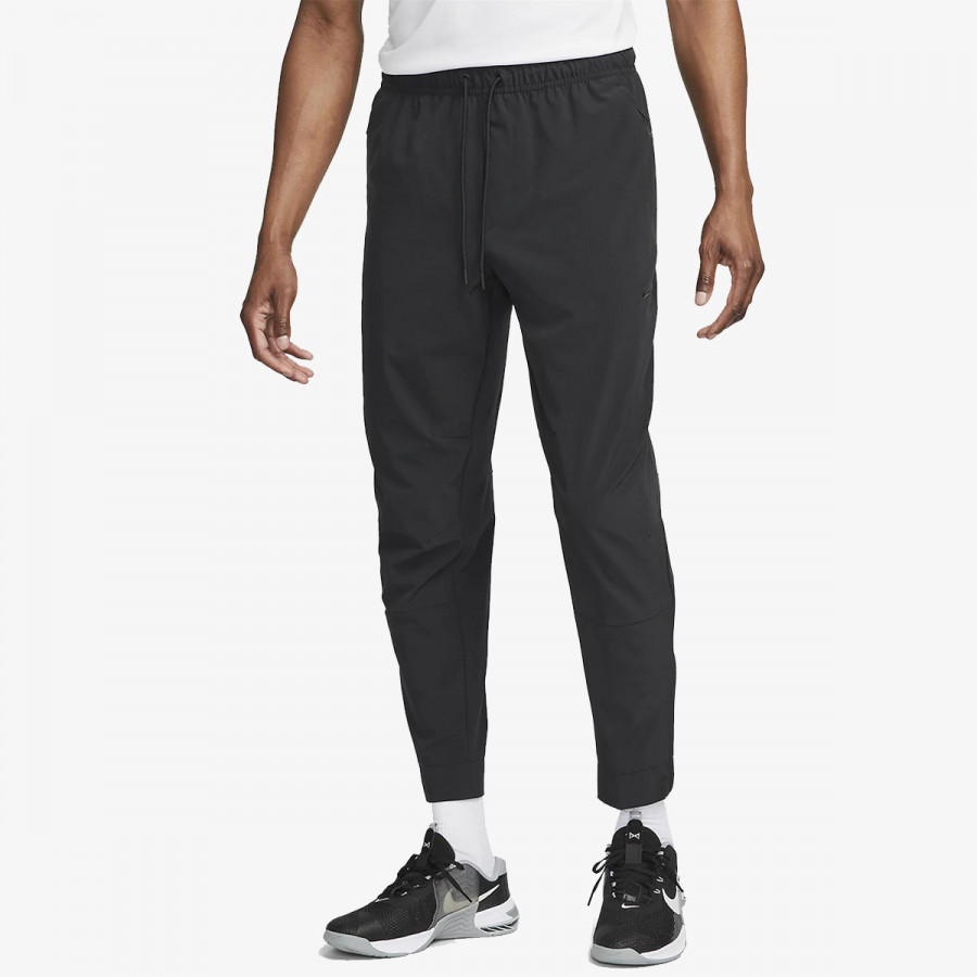 Nike Pjesa e poshtme e kostumit M NK DF UNLIMITED PANT TPR 