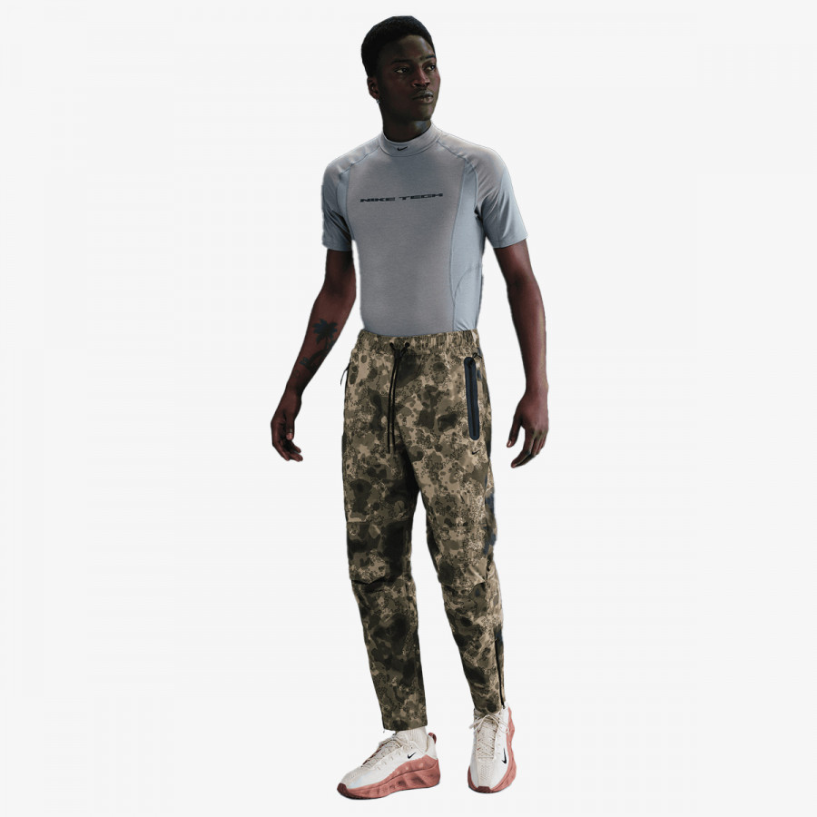 Nike Pjesa e poshtme e kostumit M TCH WVN JGGER GX AOP 
